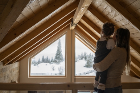 a mother and child in the attic